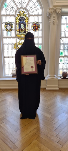 Afyah Organisation founder Khadija Ahmed receiving the Royal Borough of Greenwich civic community award. ceromony